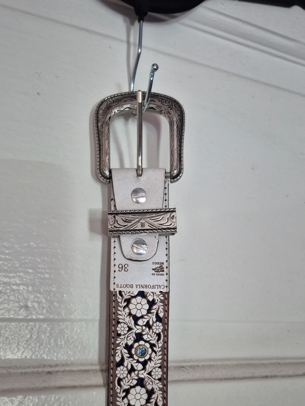 White Floral Tooled Belt with Silver Buckle